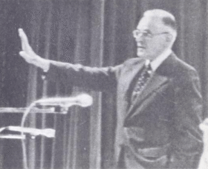 Earl Butz addressing agricultural leaders about industrial farming policy